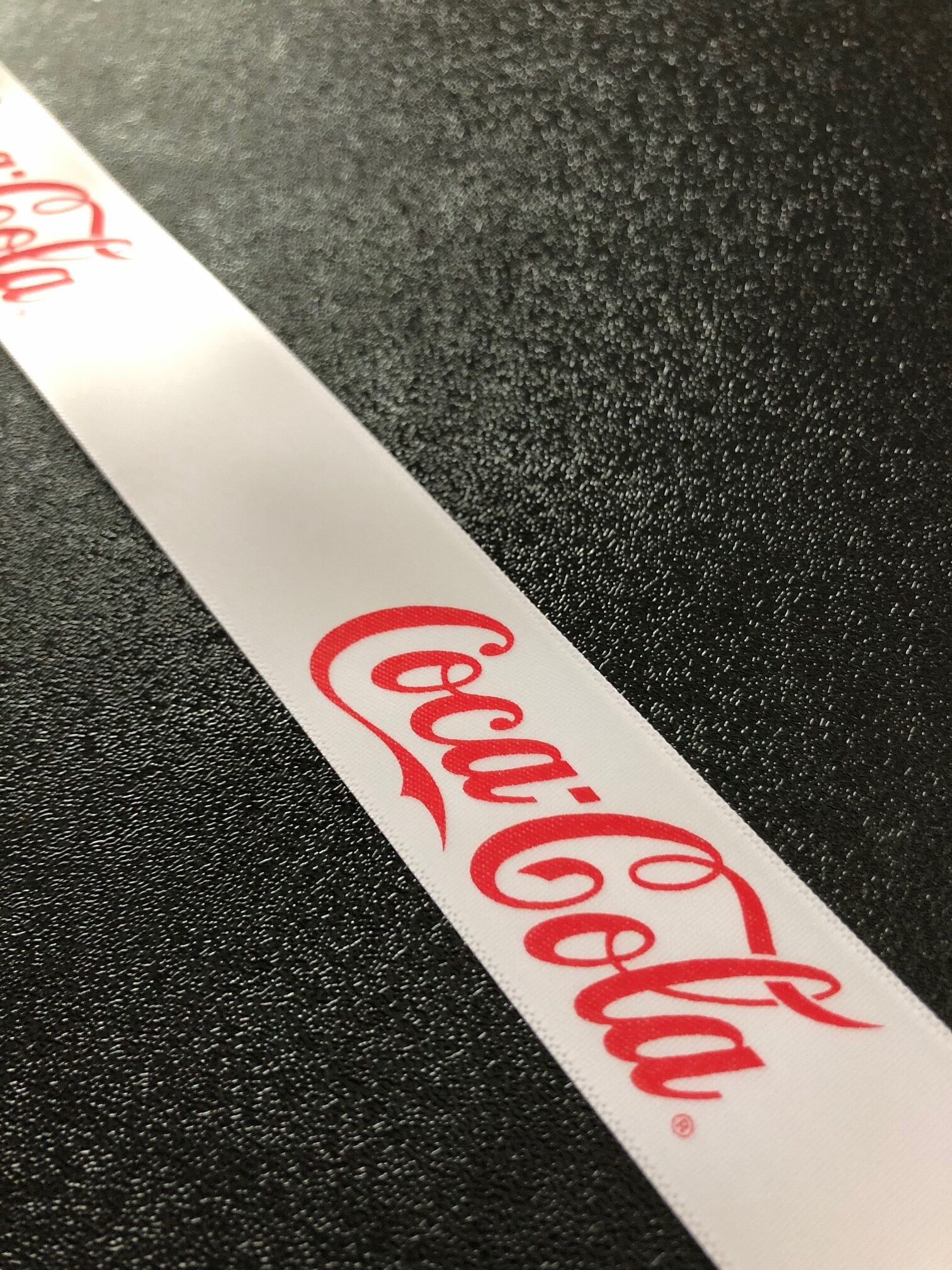 White Printed Ribbon red printed logo.
