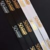 White printed ribbon with antique gold and metallic gold print