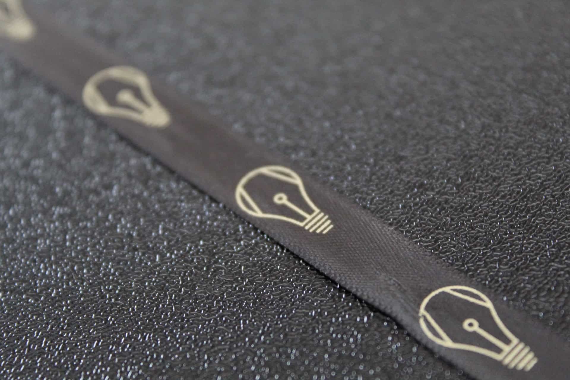 Black Satin Ribbon With Matt Antique Gold Printed logo
