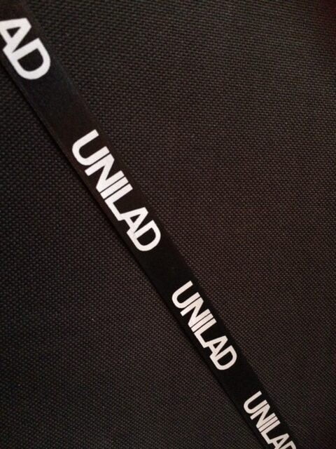 Black Satin Printed Ribbon With White Printed Logo Black Satin Printed Ribbon With White Printed Logo