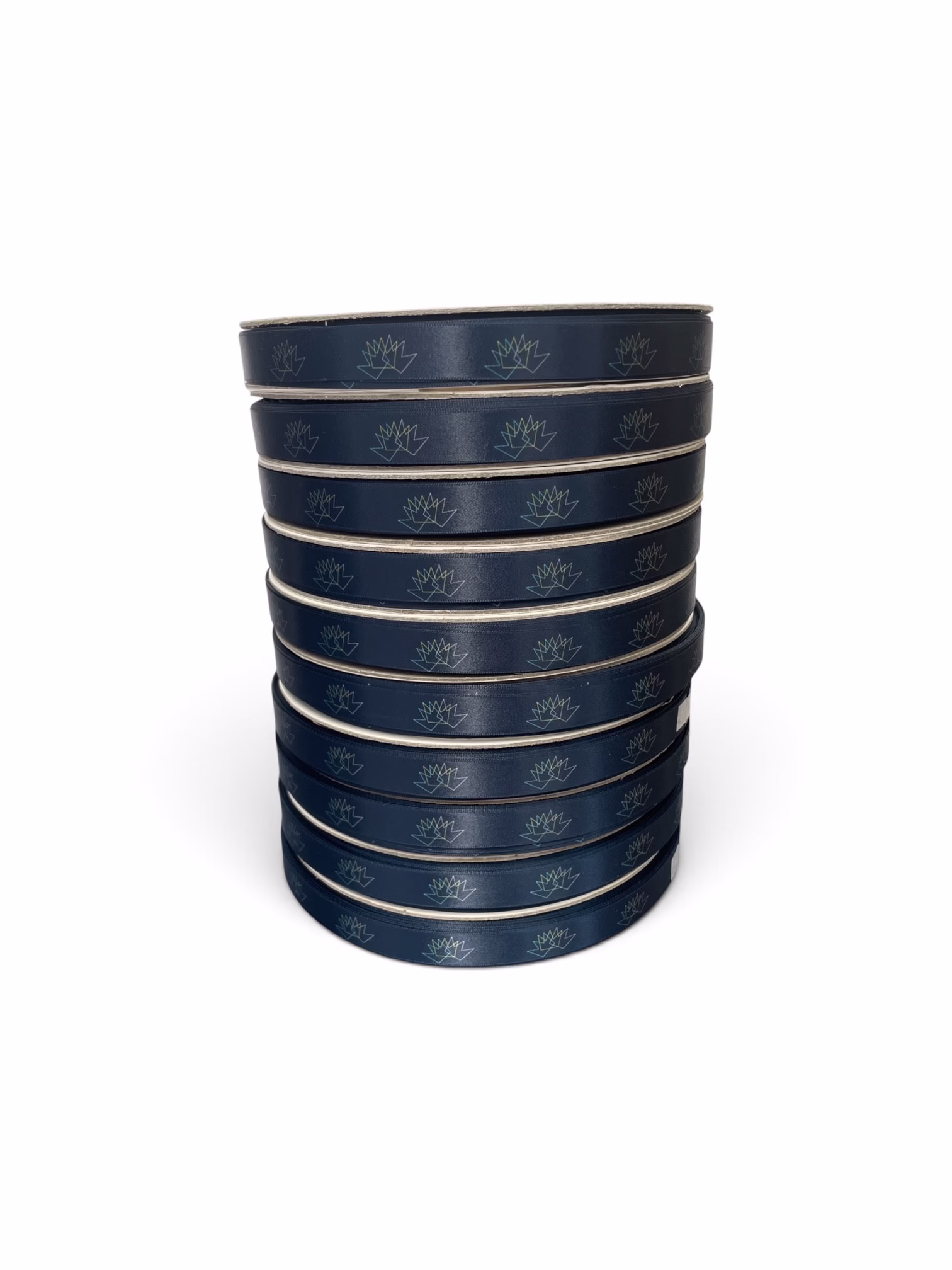 Full colour example - The Ribbon Company Stack of navy blue hockey tape rolls with a repeating maple leaf pattern and white cores, stacked tall against a white background.