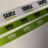 7White Ribbon with Full Colour logo, Lime Green Ribbon with Black logo and Lime Green Ribbon with White logo. White Ribbon with Full Colour logo, Lime Green Ribbon with Black logo and Lime Green Ribbon with White logo.