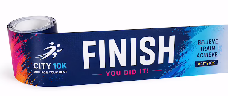 Finishing Line Ribbon image Finish banner for City 10K race with bold 'FINISH', pink 'YOU DID IT!' text, and a colorful blue-to-gradient background on the ribbon.